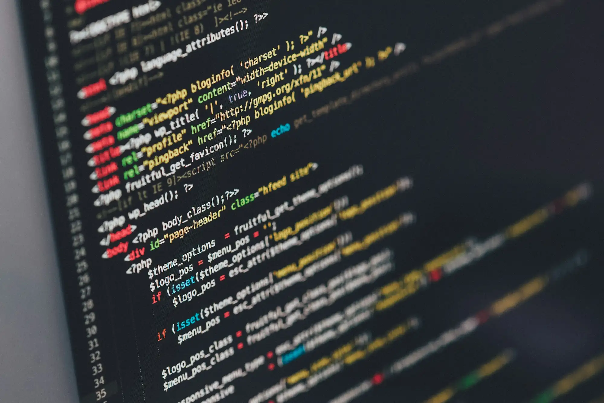A monitor showing code
